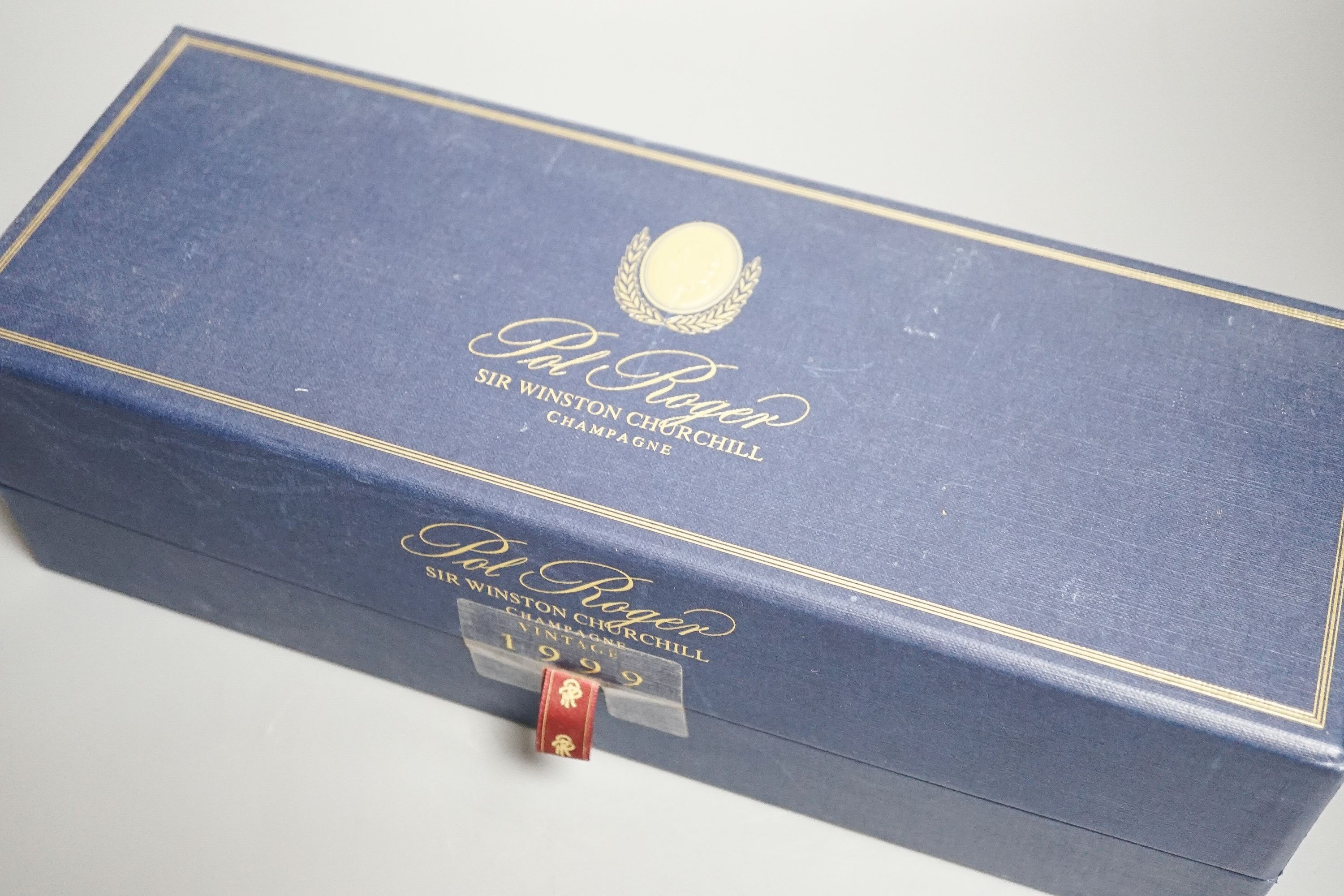 A cased bottle of Pol Roger Sir Winston Churchill champagne 1999